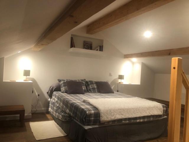 Ένα ή περισσότερα κρεβάτια σε δωμάτιο στο Chambre d'hôtes