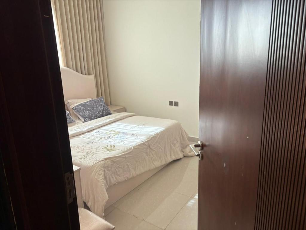 Postel nebo postele na pokoji v ubytování حائل