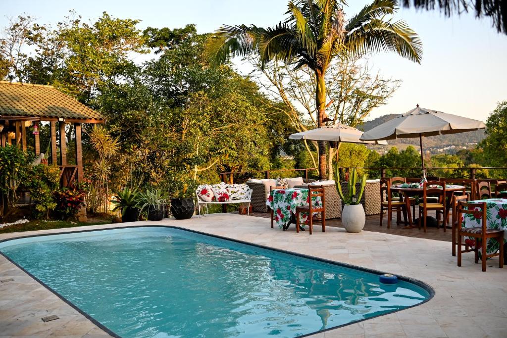 Πισίνα στο ή κοντά στο Chalé Oxossi