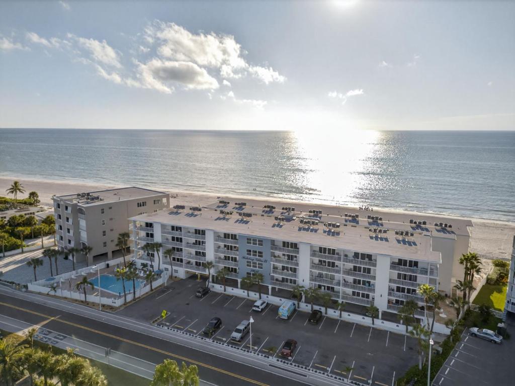 an aerial view of a hotel and the ocean at Holiday Villas II Unit 301 in Clearwater Beach