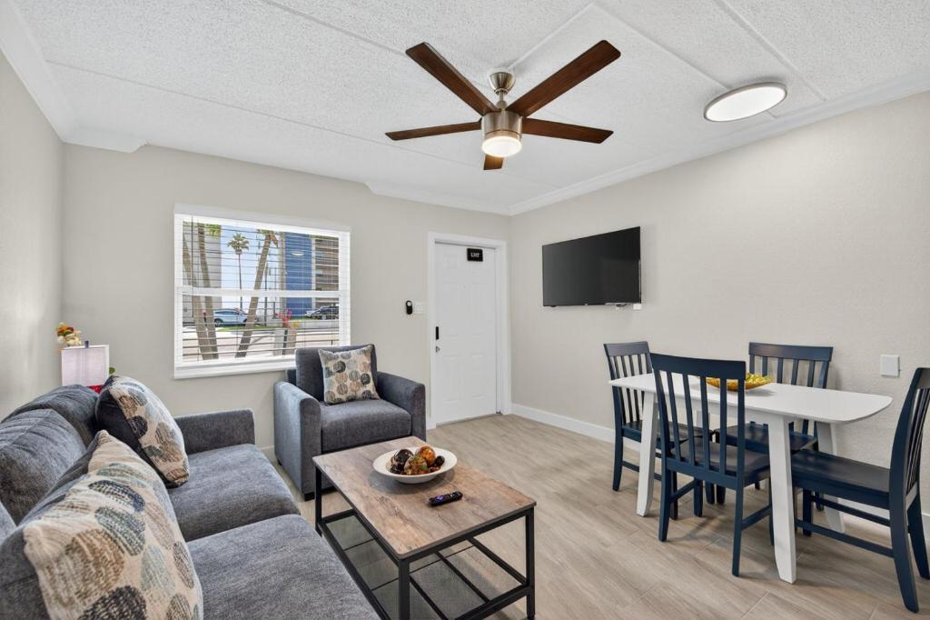 a living room with a couch and a table at Sunset Beach Suites Unit 4 in St. Pete Beach