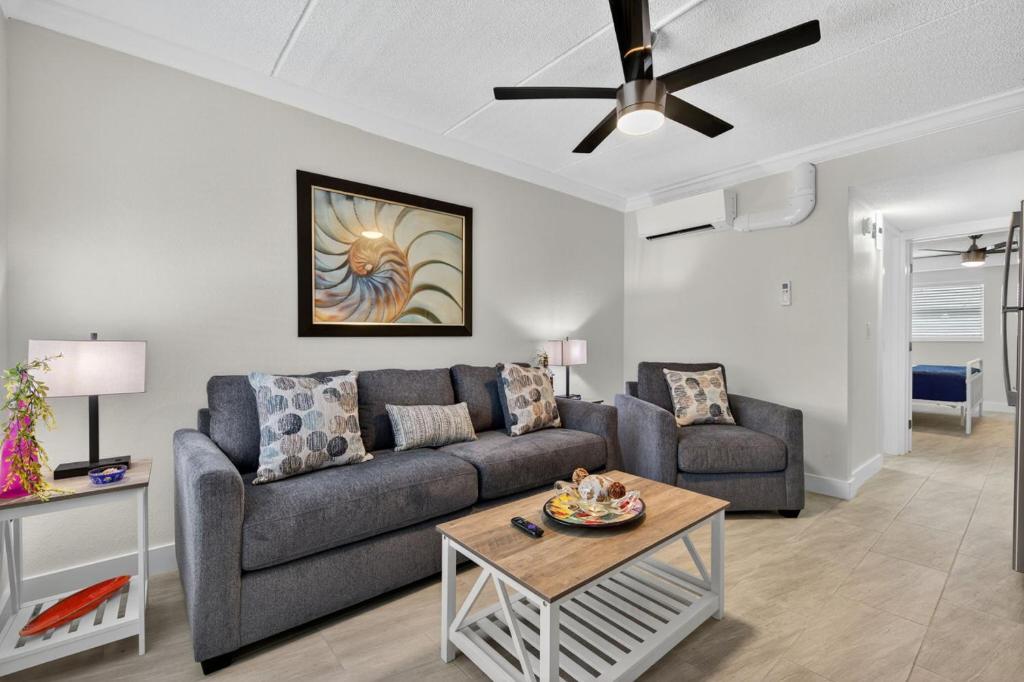 a living room with a couch and a table at Sunset Beach Suites Unit 2 in St. Pete Beach