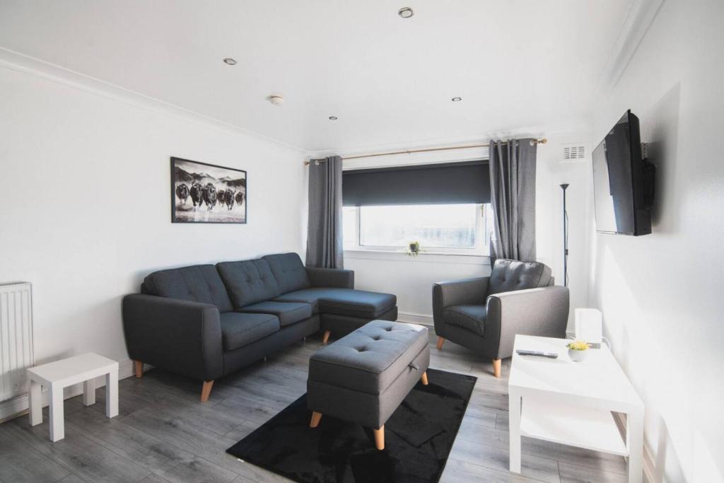 Et opholdsområde på Modern 3BR Flat with Parking