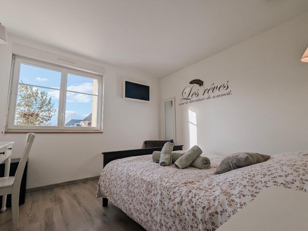 Postel nebo postele na pokoji v ubytování Maxime - FR-1-591-698