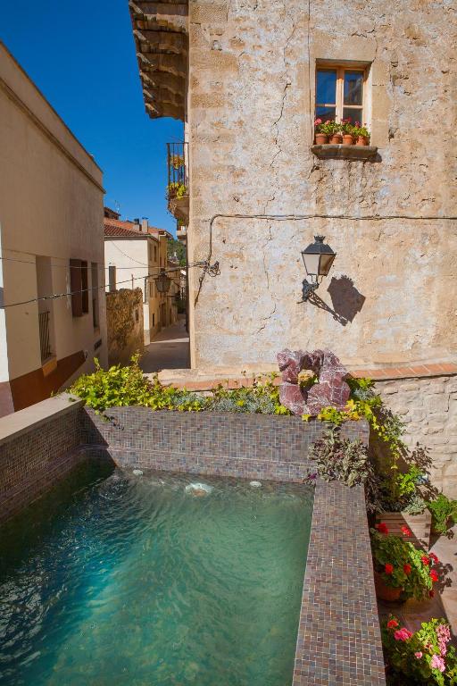 Bazén v ubytování Hotel del Sitjar nebo v jeho okolí