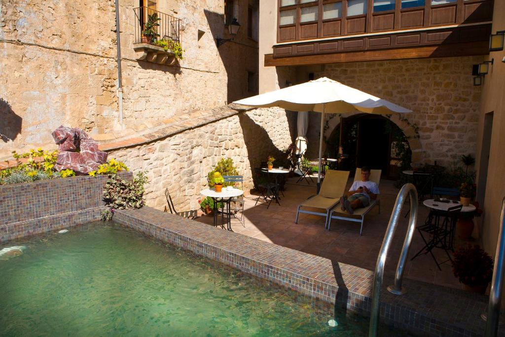 Bazén v ubytování Hotel del Sitjar nebo v jeho okolí