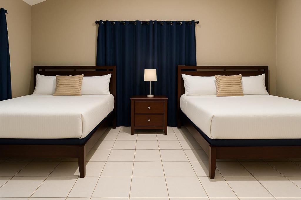 Ένα ή περισσότερα κρεβάτια σε δωμάτιο στο Stellarium Hotel