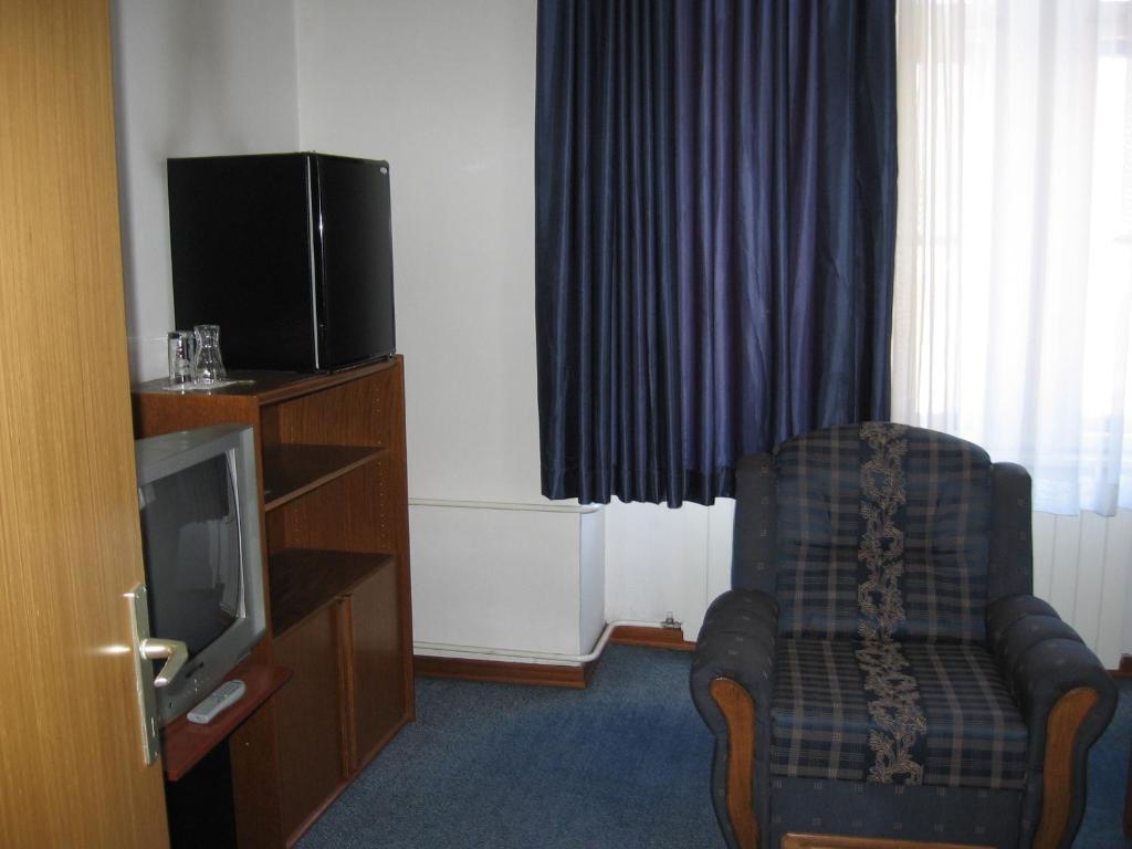 TV in/ali zabaviščno središče v nastanitvi Hotel Veli Jože
