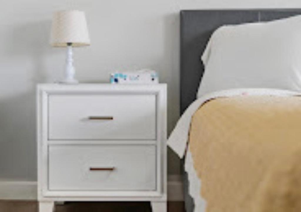 Ένα ή περισσότερα κρεβάτια σε δωμάτιο στο Mint Motel