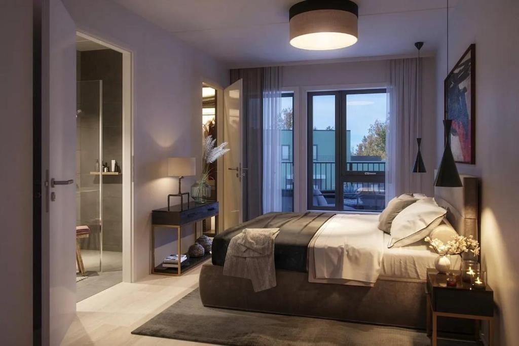 Postel nebo postele na pokoji v ubytování A Cosy flat Close to Airport, Train and shopping