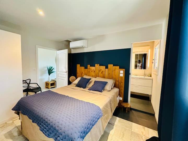 Postel nebo postele na pokoji v ubytování Appartement Ortale de Biguglia