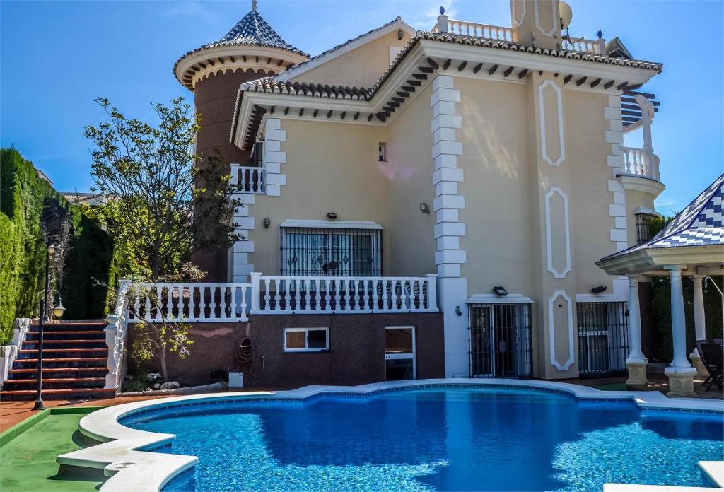 een villa met zwembad voor een huis bij CASABA - Boutique - Torre del Mar in Torre del Mar