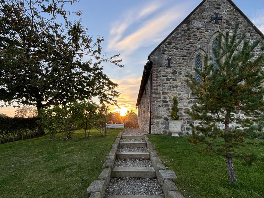 Amanecer o atardecer desde la casa vacacional o alrededores