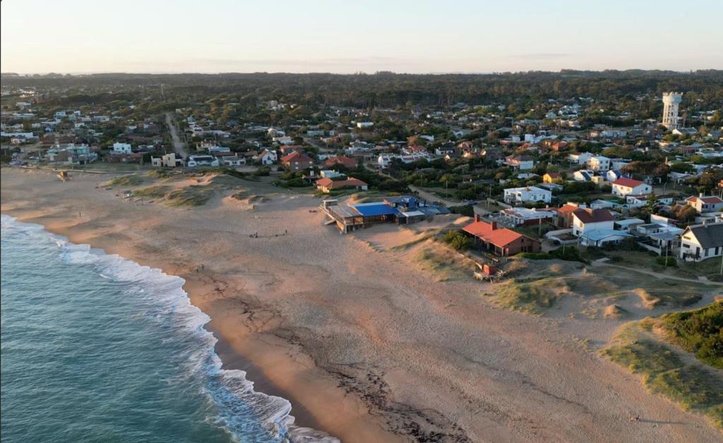 an aerial view of a beach with houses at Balconada Rooms in La Paloma