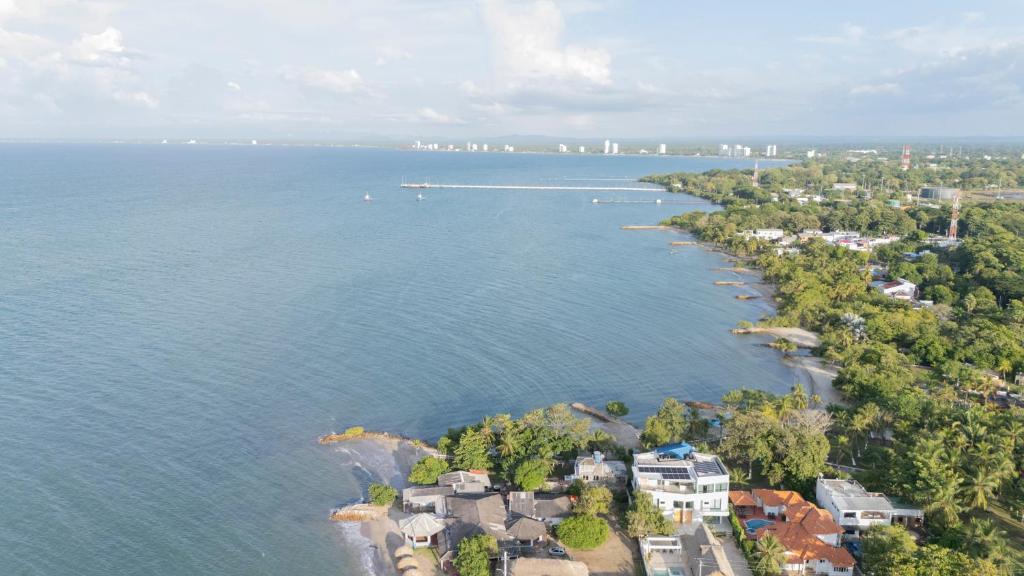 an aerial view of the shoreline of a lake at Casa Claro del Mar in Coveñas