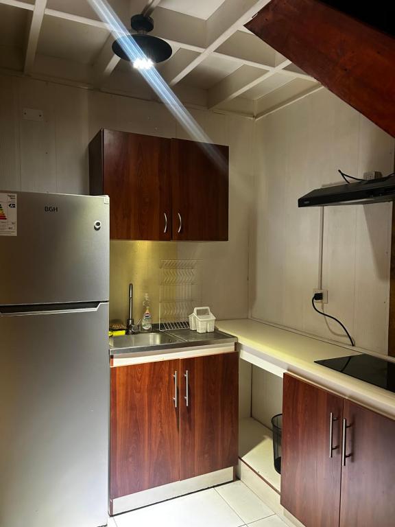 Kuchyň nebo kuchyňský kout v ubytování Departamento Privado y Moderno Javiera carrera Cerca portal mall