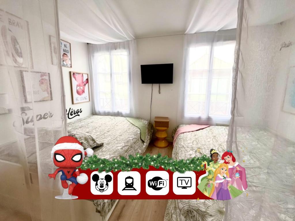 Μια τηλεόραση ή/και κέντρο ψυχαγωγίας στο Cosy Disney Studio - Princess & Marvel World - 6 min to Disneyland Paris