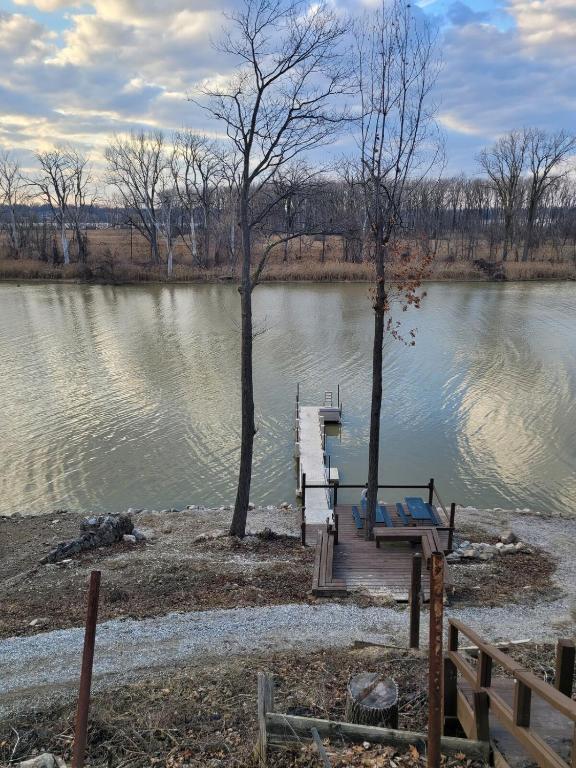 a dock in the middle of a lake at Perrysburg On The River in Perrysburg