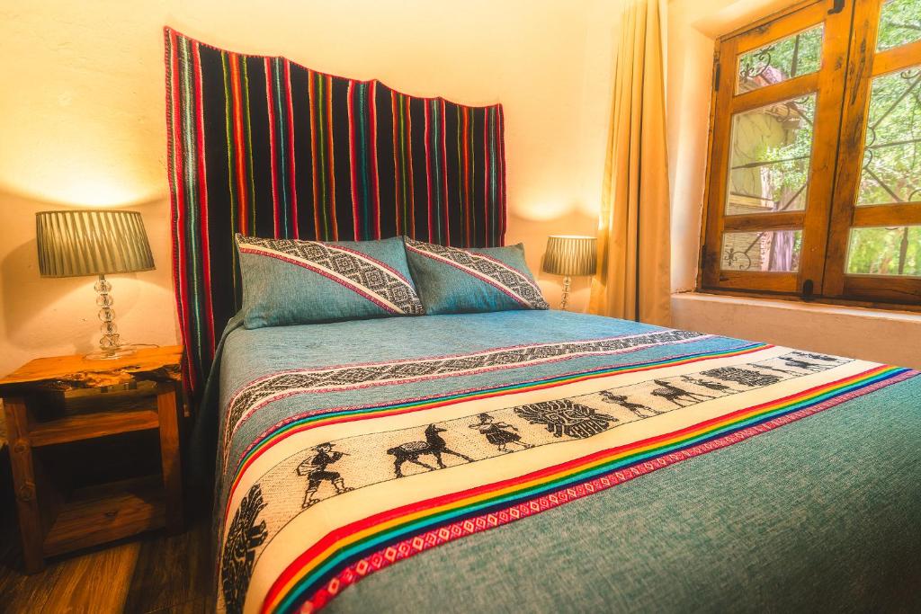 Postel nebo postele na pokoji v ubytování Ckoi Atacama Lodge