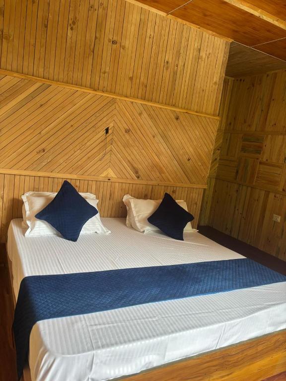 Ένα ή περισσότερα κρεβάτια σε δωμάτιο στο SRT Homes