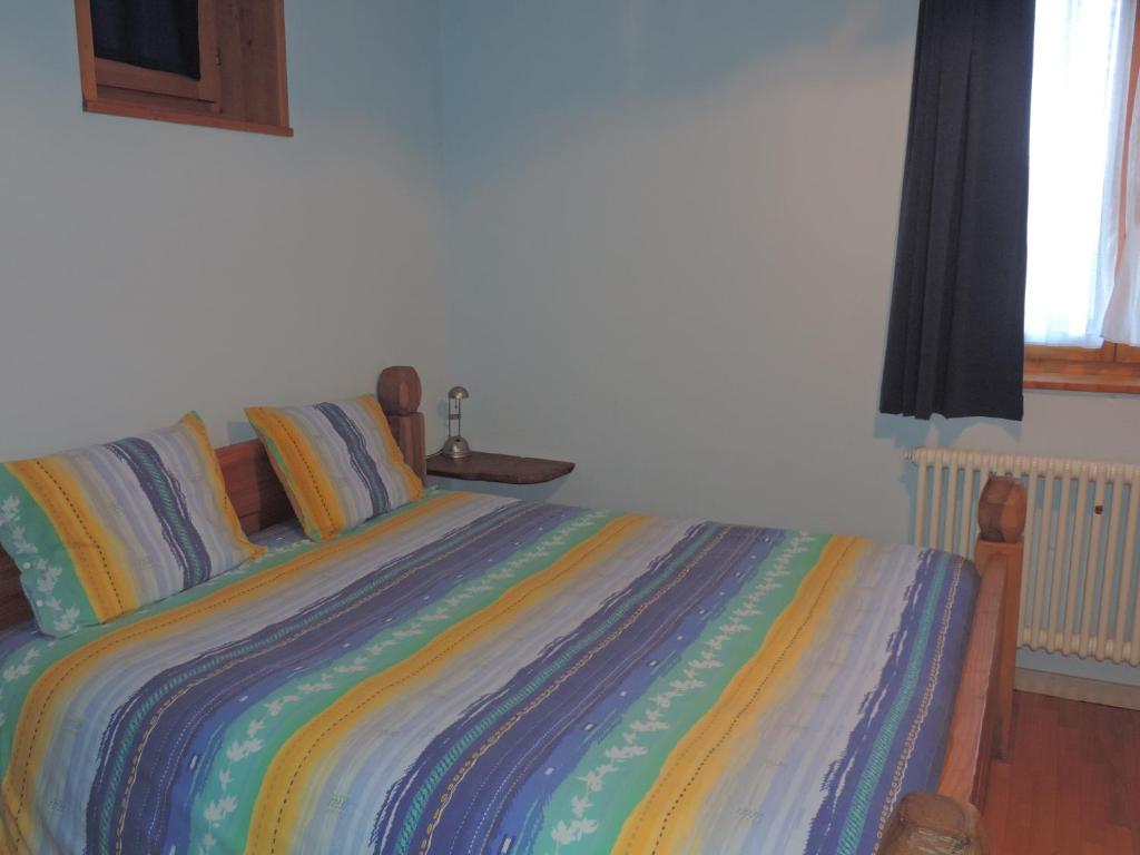 Postel nebo postele na pokoji v ubytování Agriturismo Zertin