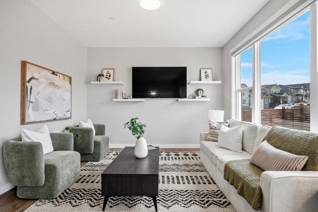 TV a/nebo společenská místnost v ubytování The Herron Rise Retreat