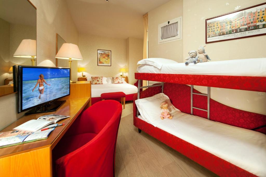 Postel nebo postele na pokoji v ubytování Hotel Kursaal
