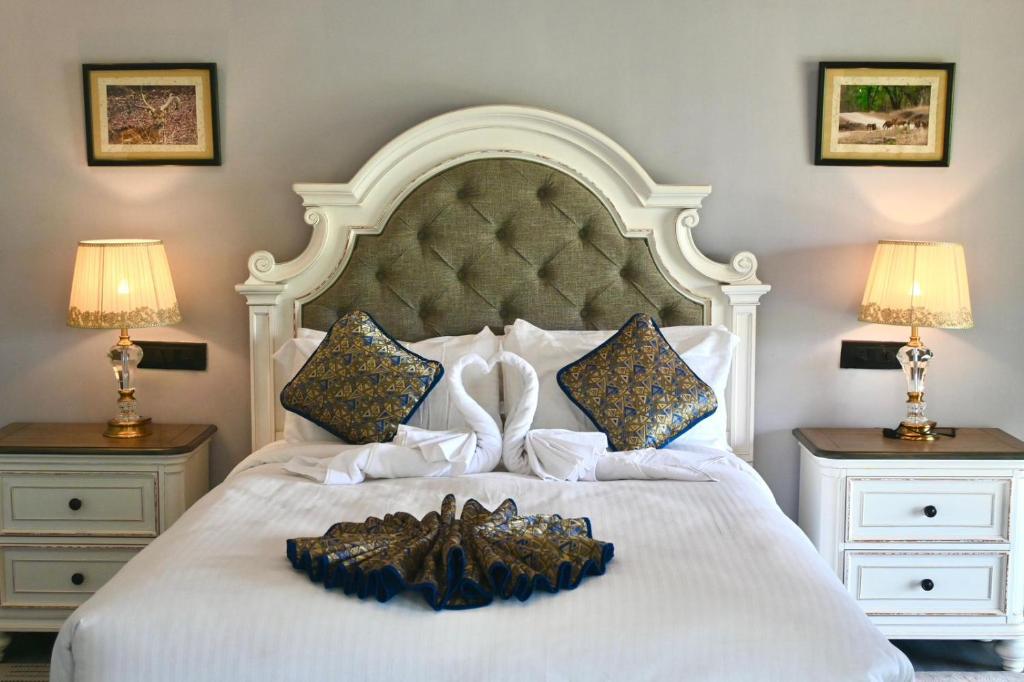 Ένα ή περισσότερα κρεβάτια σε δωμάτιο στο Tuli Orchid