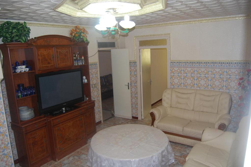 TV a/nebo společenská místnost v ubytování Appartement alhoceima