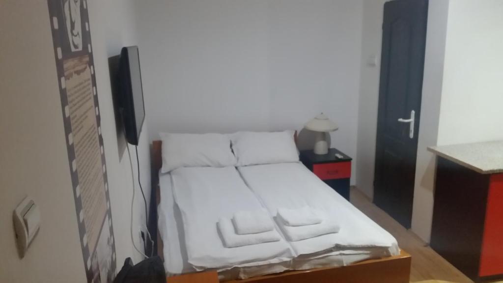 Postel nebo postele na pokoji v ubytování Apartments Agape