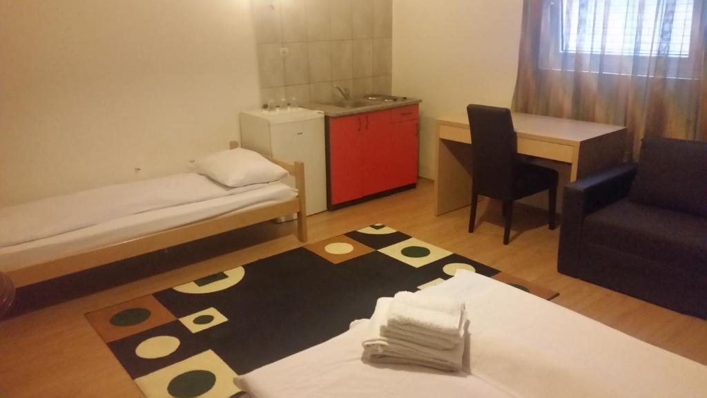 Postel nebo postele na pokoji v ubytování Apartments Agape
