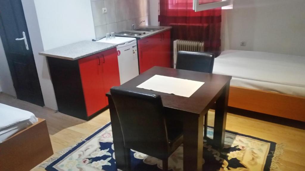 Kuchyň nebo kuchyňský kout v ubytování Apartments Agape