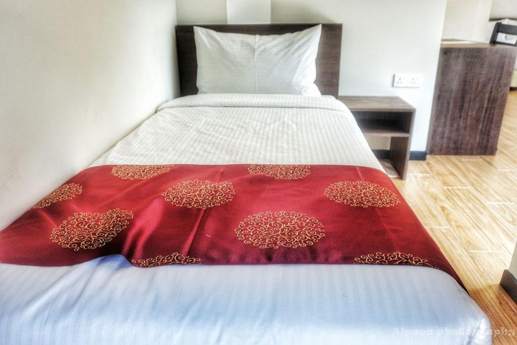 Postel nebo postele na pokoji v ubytování Nex Hotel Johor Bahru