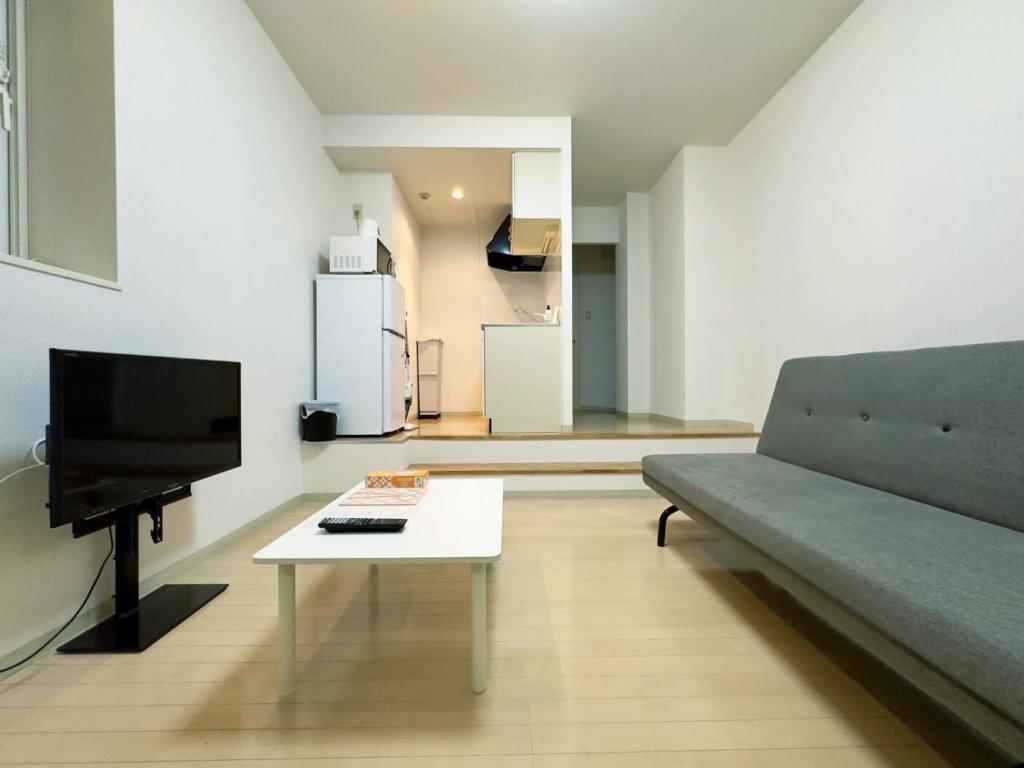 Μια τηλεόραση ή/και κέντρο ψυχαγωγίας στο 411札幌駅7分と大通駅徒歩6分で好立地な都心を満喫でき綺麗な部屋で快適が生活が実現