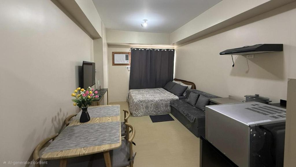 Una cama o camas en una habitación de CDO City Center Avida Condo Fast Wifi