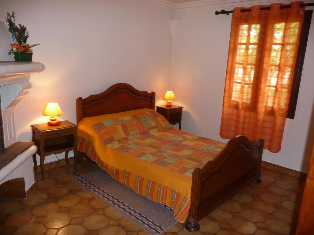 Postel nebo postele na pokoji v ubytování Le coin tranquille