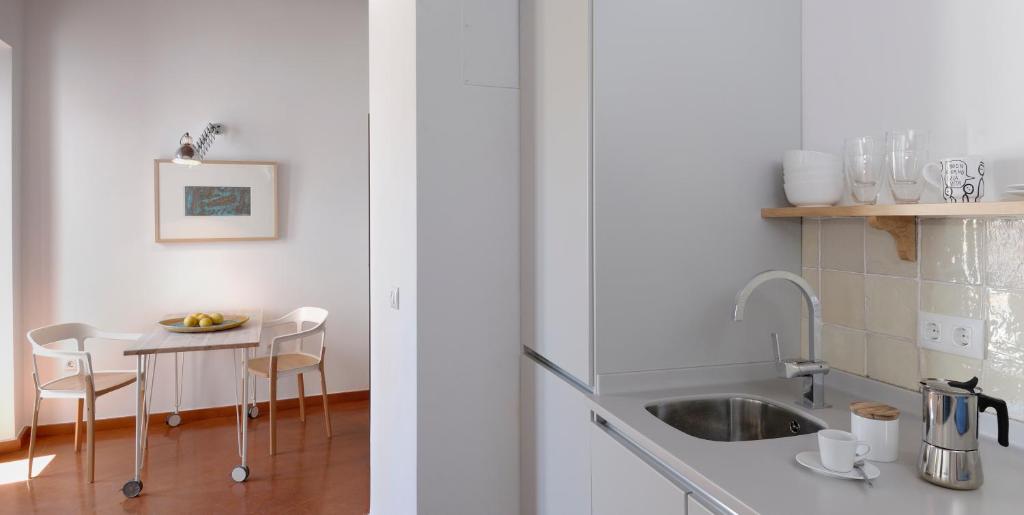 Kuchyňa alebo kuchynka v ubytovaní Apartamentos La Hoguera