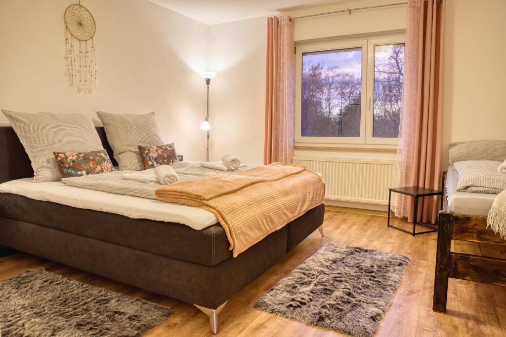 Postel nebo postele na pokoji v ubytování Krumpes Quarters