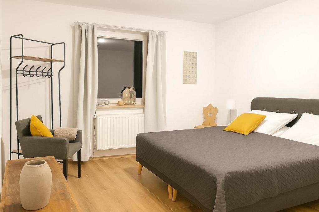 Postel nebo postele na pokoji v ubytování Craftsmen Home Handwerker Heimat