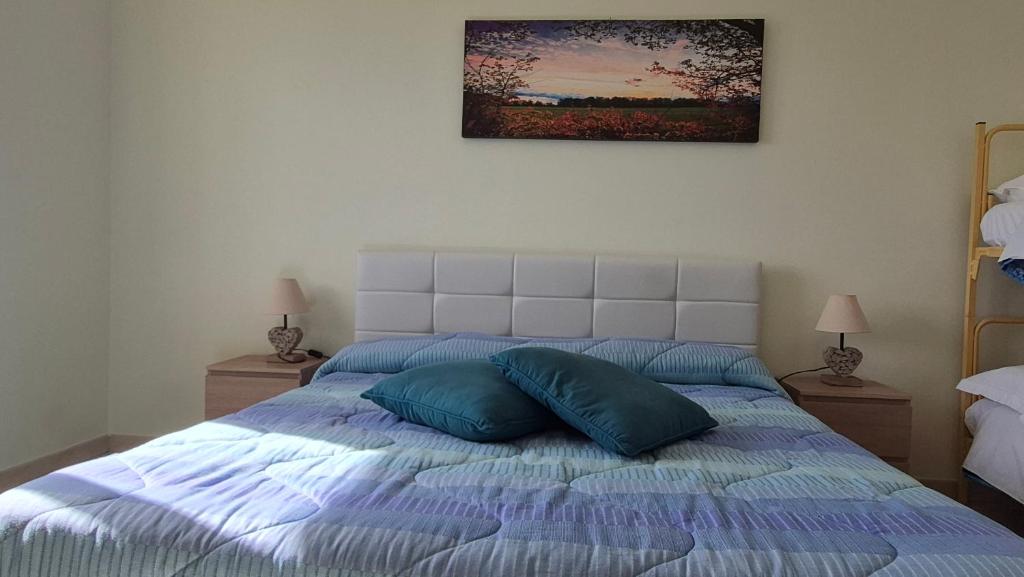 Postel nebo postele na pokoji v ubytování Heron House Appartaments