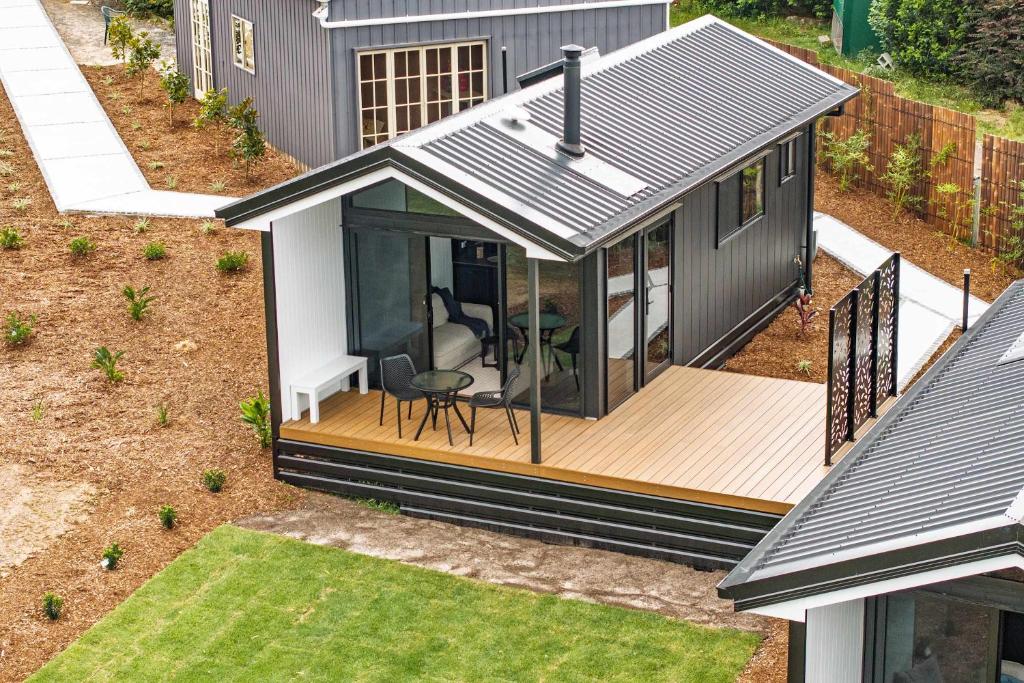 an overhead view of a tiny house with a deck at Bottlebrush Villa in Valdora
