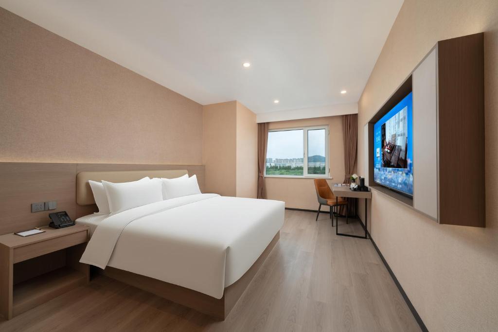 Φωτογραφία από το άλμπουμ του Ward Smart Hotel Jinan Yaogu Weizhen Business Port Branch 