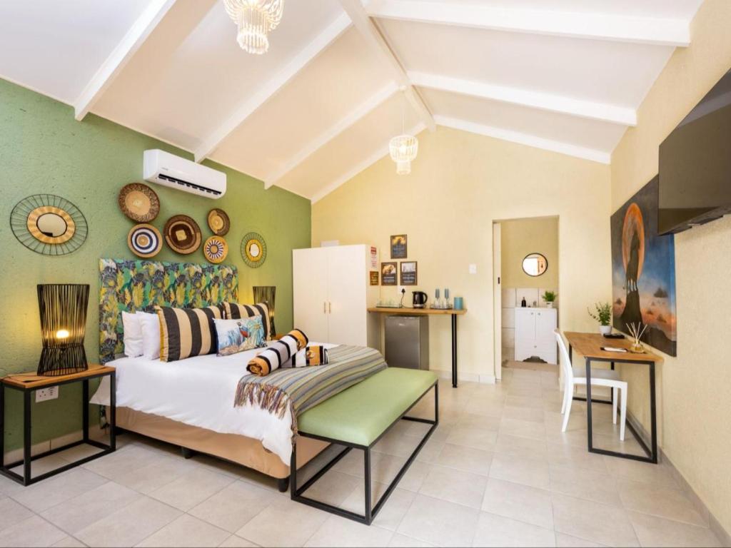 Η κουζίνα ή μικρή κουζίνα στο Zabini Lodge Rooms With Private Pools