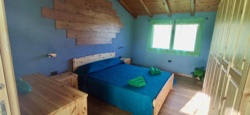 Postel nebo postele na pokoji v ubytování Su Kiniperu