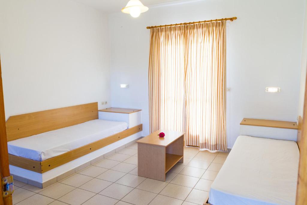 Postel nebo postele na pokoji v ubytování Ideal Hotel