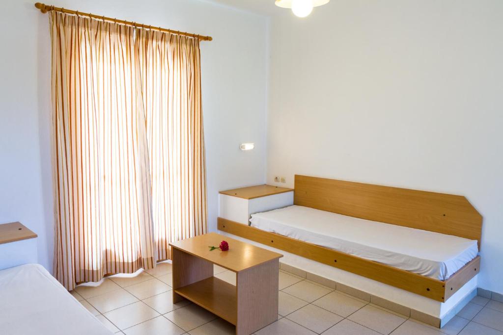 Postel nebo postele na pokoji v ubytování Ideal Hotel