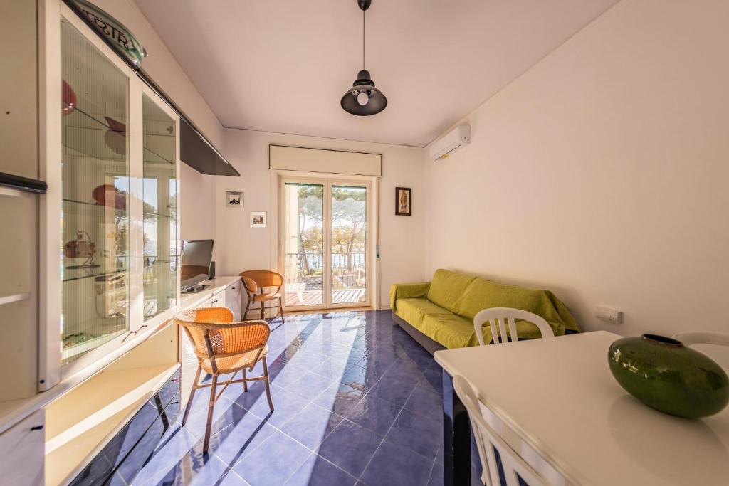 a living room with a couch and a table at Casa D'Amato - Nel cuore di Maiori in Maiori