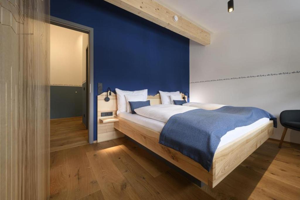 A bed or beds in a room at Haus Sternenhimmel