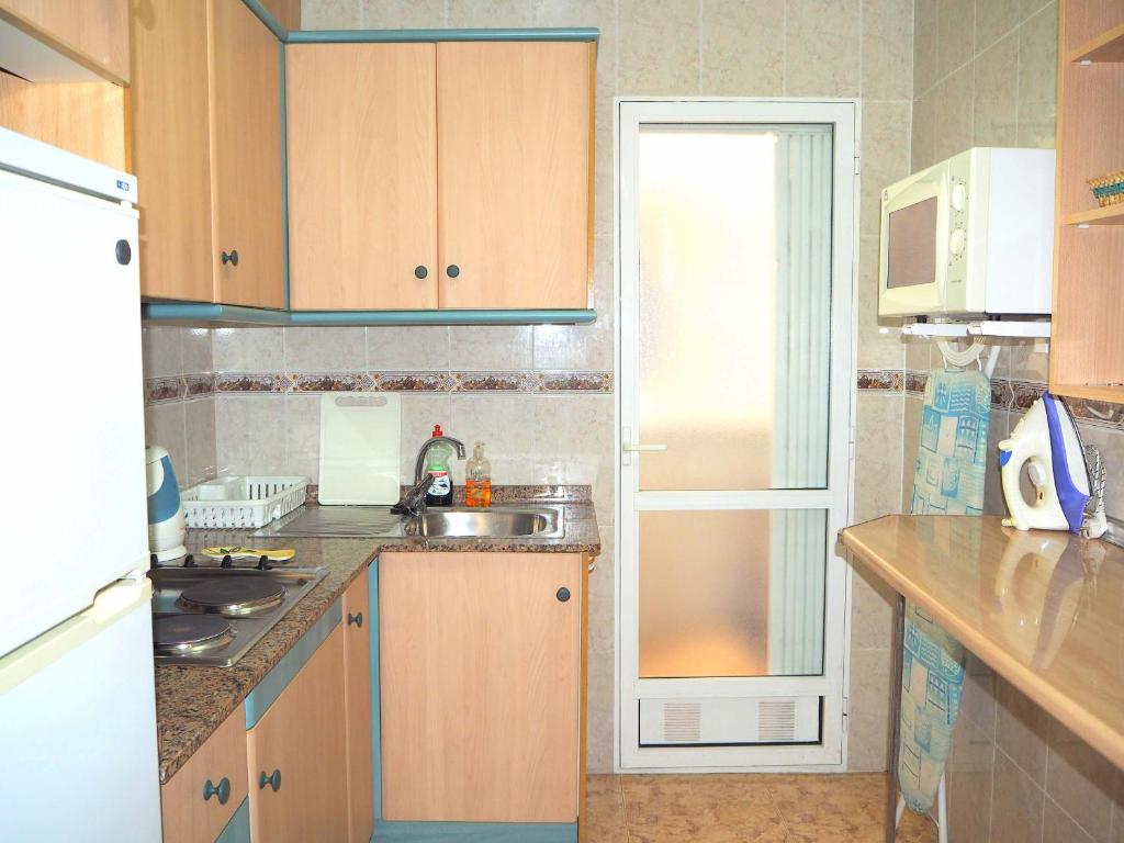 Kuchyň nebo kuchyňský kout v ubytování Espanhouse Diego apartment