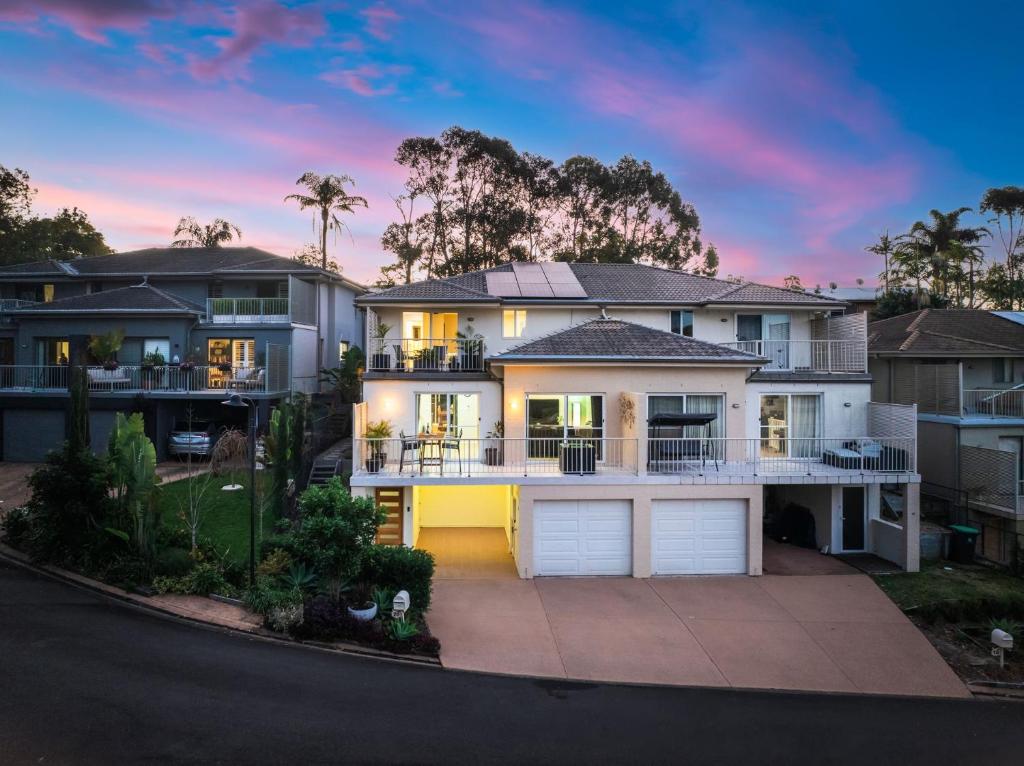 an image of a house with a driveway at Luxury at Lagoon Estate in Nelson Bay